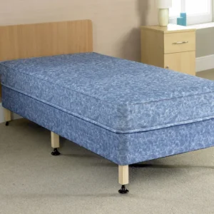 A bed with six legs, a wood headboard and blue mattress.